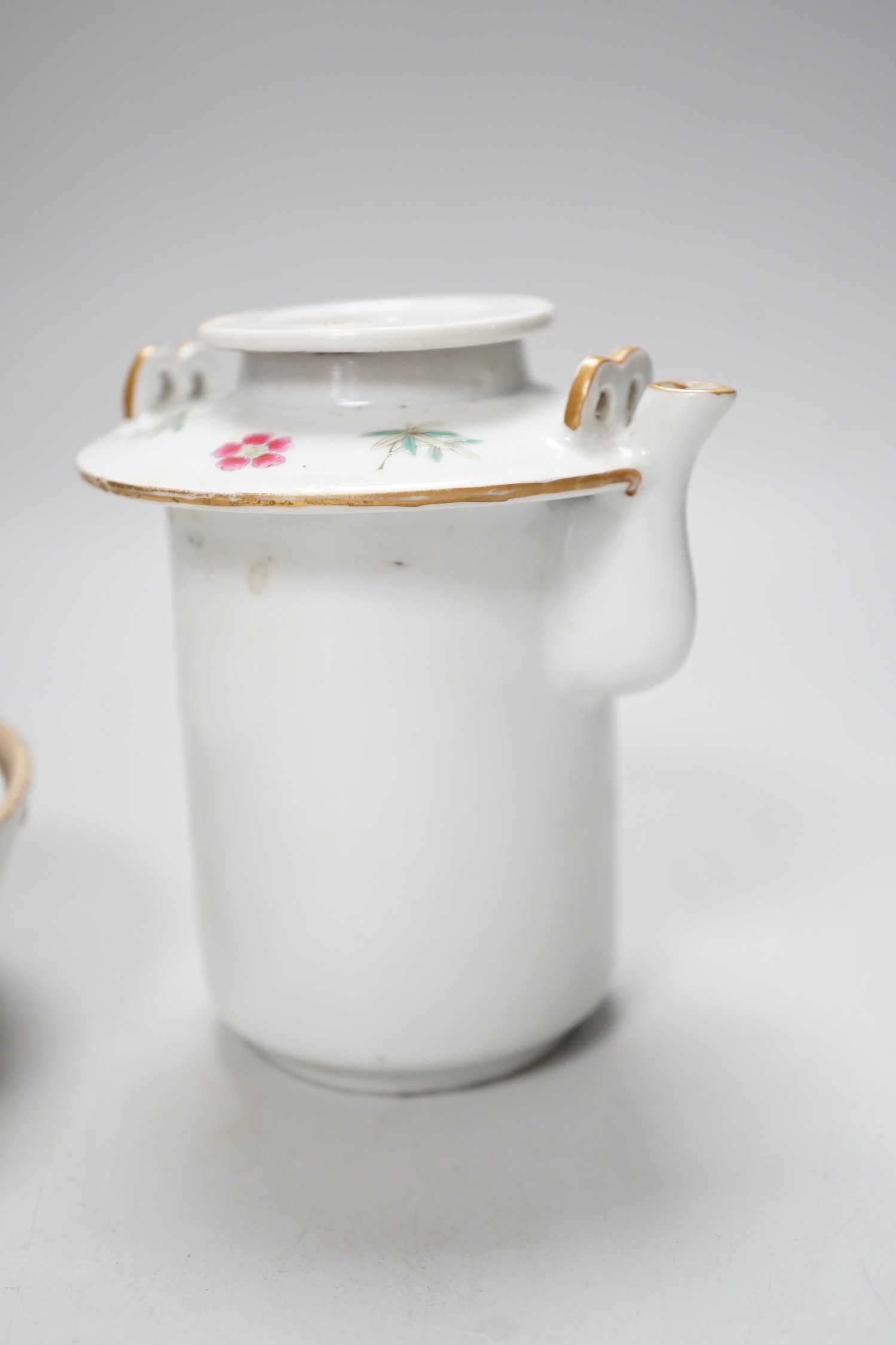 A Chinese famille rose teapot and a cover, together with a similar dish. 12cm tall